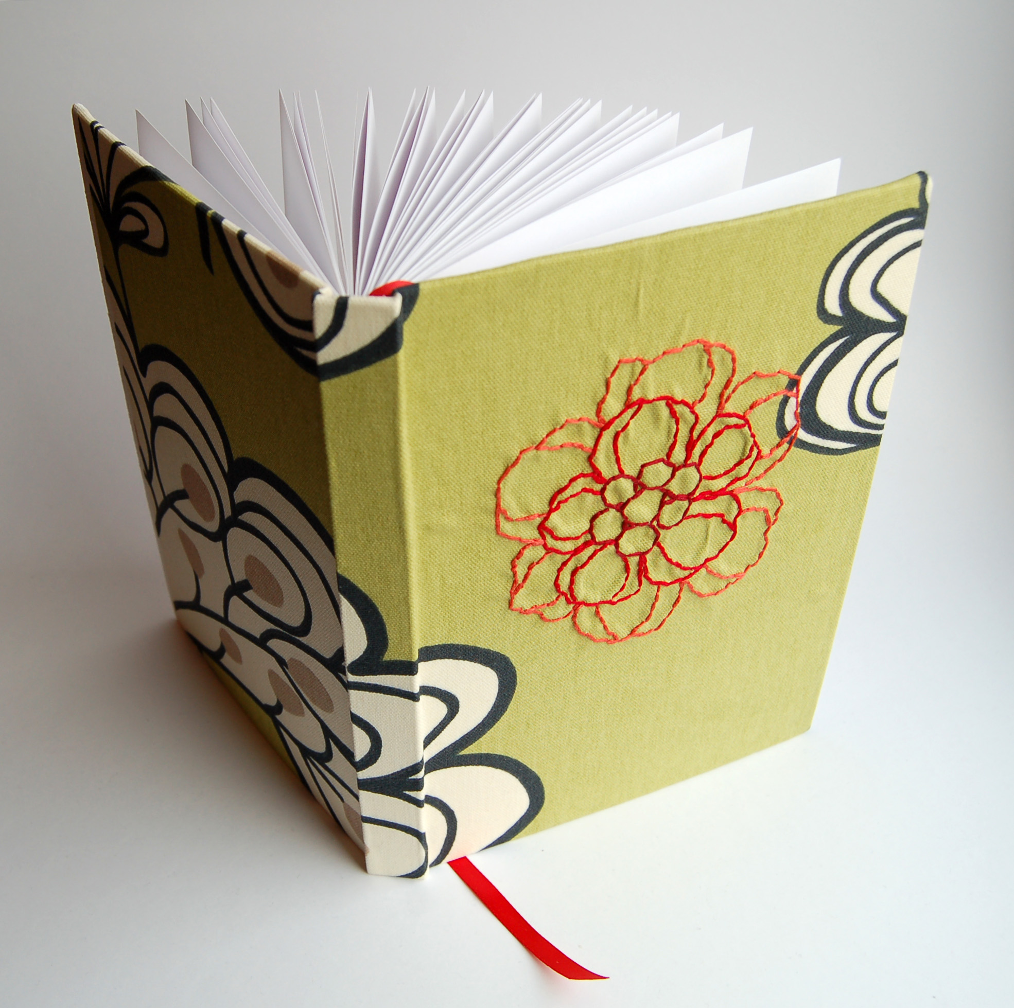 Camilla Lekebjer Handmade book with flower embroidery