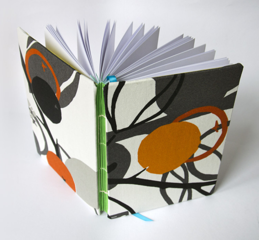 Camilla Lekebjer Handmade book with green accordion spine