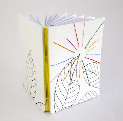Camilla Lekebjer Handmade book with multi-colored sunbeams